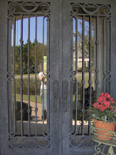 Door with metal patina faux finish