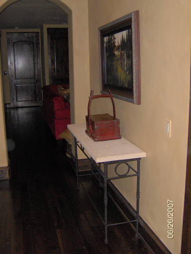 Table with a pewter metal patina faux finish