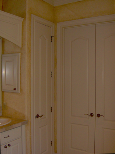 Plaster with aged faux finish in Master Bath