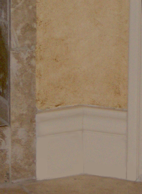 Plaster with aged faux finish detail