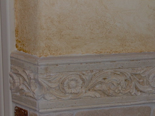 Plaster with aged faux finish detail